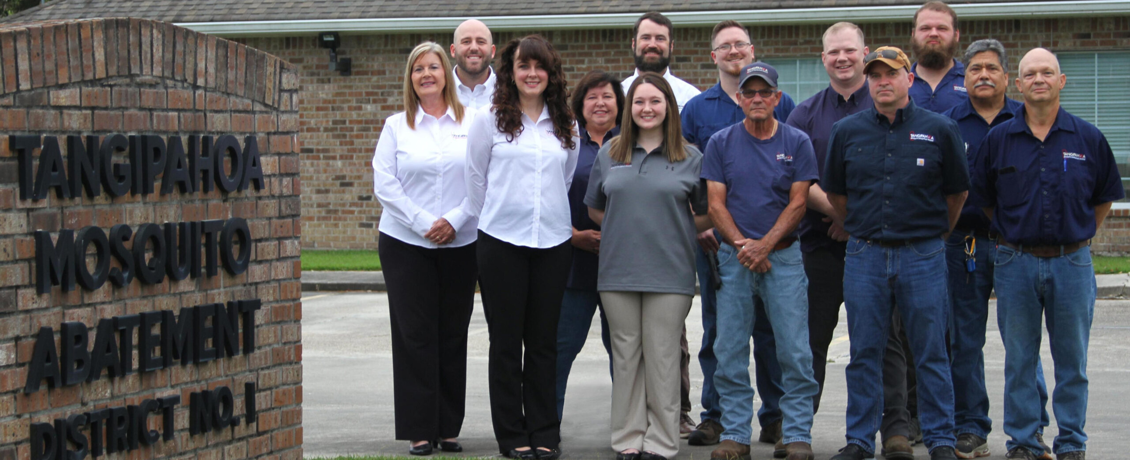 The Tangipahoa Mosquito abatement staff stands in front of the office for a group photo